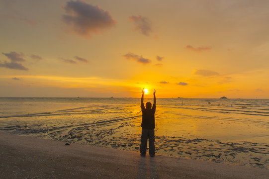 Scenery of sunset captured at Pantai Remis, Selangor, Malaysia. The motion of cloud and water is due to long exposure effect. Low light