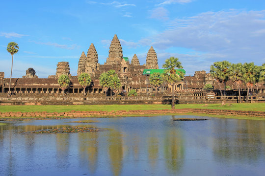 angkor wat temple reflection on the water in sunny day at  Siem reap, Cambodia. 