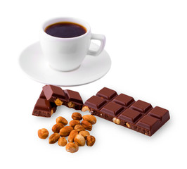 White cup of coffee and chocolate with nuts