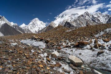 Obraz premium K2 mountain with clouds on top and Baltoro glacier, K2 trek, Pakistan