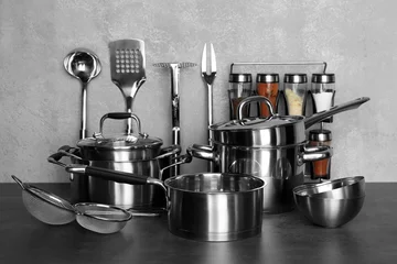 Selbstklebende Fototapeten Utensils for cooking classes on table in kitchen © Africa Studio