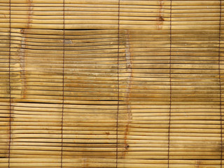 Texture of an old worn bamboo sun shade for various wooden backgrounds