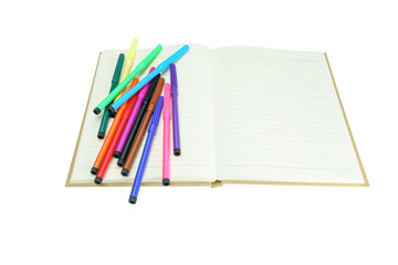 MultiColored Felt-Tip Pens or marker pens on notebook isolate on white background