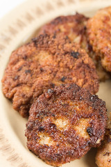 Fried meatballs served on the table isolated over white background