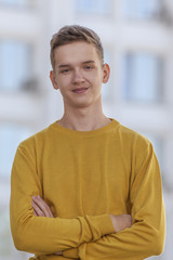 Portrait of adolescent  boy outdoors