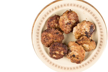 Fried meatballs served on the table isolated over white background
