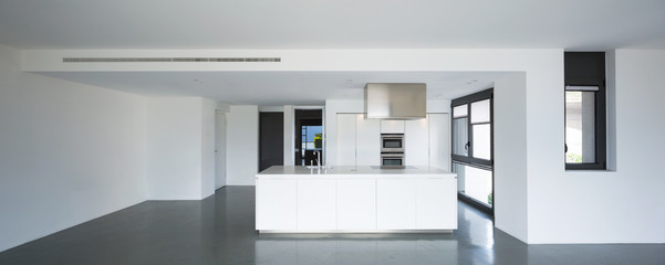 Fototapeta na wymiar White kitchen in modern flat