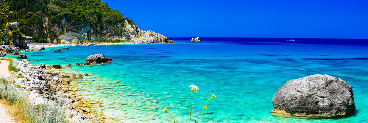 Naklejka na ściany i meble Turquoise beautiful beaches of Lefkada island, Agios Nikitas village .Greece
