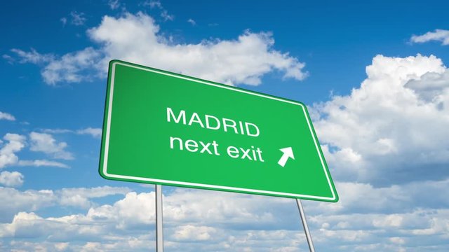 Animated road sign (Madrid), with a time lapsed sky as backdrop. 