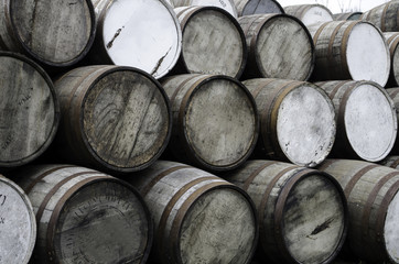 wooden barrels at the distiiery - 159842201