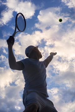 tennis player serving outdoor