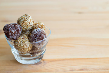 Homemade healthy paleo dates and chocolate energy balls. Vegan truffles.