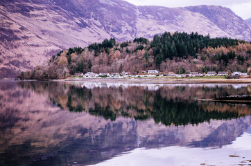 reflected lake in scotland - 159843059