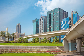 Obraz na płótnie Canvas Dubai - The high buildings and viaducts of Downtown.