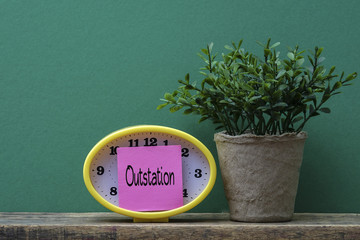Yellow clock and post it note ,time management conceptual. Copy space