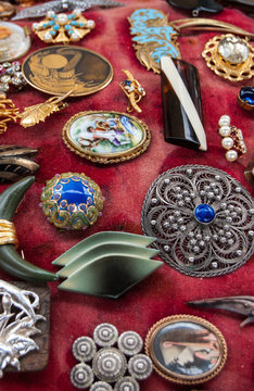 Jewelry background. Vintage brooches at flea market in Paris (France).