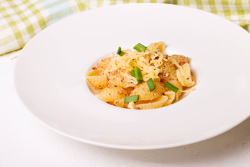conchiglioni shell pasta alfredo with parmesan cheese
