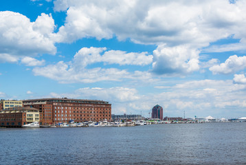 View of buildings along the waterfront in Fells Point, Baltimore, Maryland.