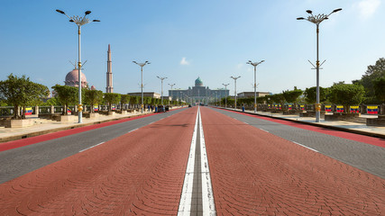 Empty road to the Prime Minister Palace and Masjid Putra Mosque in Putrajaya, Malaysia