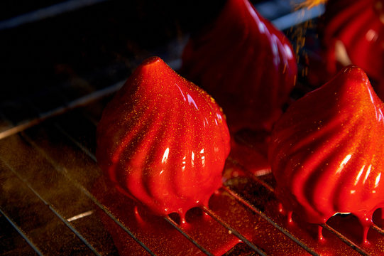 Fire berry cake, A delicate cream mousse, covered with incredibly shiny mirror-like glaze on the condensed milk, hides inside serdtsevinka of lemon jelly and ganache is incredibly useful oblepiha