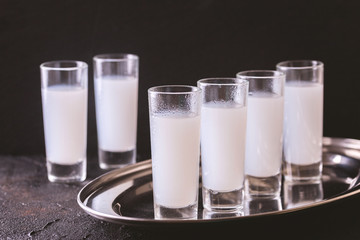 Arabic alcohol Raki with anis and ice. Arak, Ouzo