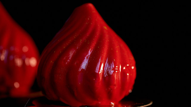 Fire berry cake, A delicate cream mousse, covered with incredibly shiny mirror-like glaze on the condensed milk, hides inside serdtsevinka of lemon jelly and ganache is incredibly useful oblepiha