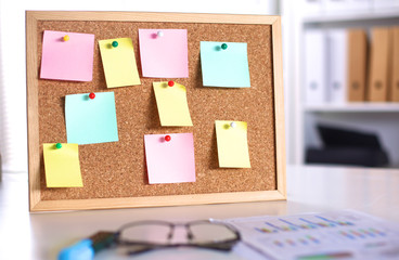 Cork board with notes, clipping path included