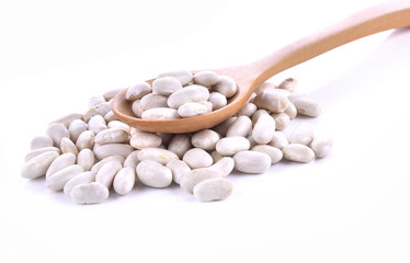 White kidney bean in wood spoon on white background