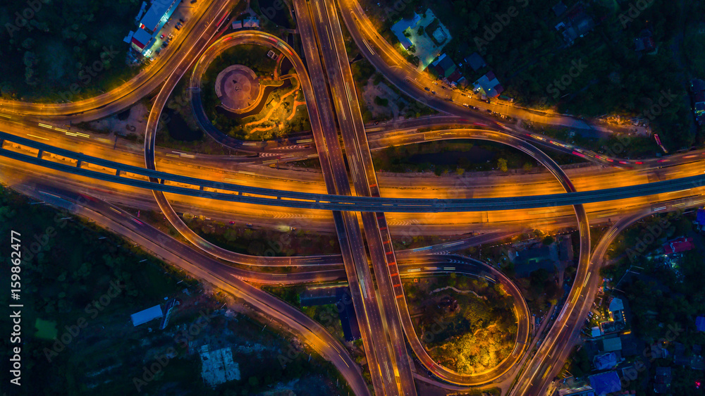 Wall mural Bangkok Expressway top view, Top view over the highway,expressway and motorway at night, Aerial view interchange of a city, Shot from drone, Expressway is an important infrastructure in Thailand