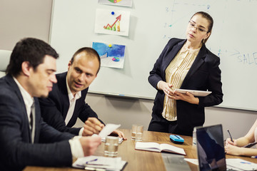 Business People Meeting Conference Discussion Corporate Concept,business team,business partners discussing documents and ideas,Business conference in a modern office,close up