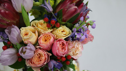 Bloom mix flowers and colorful roses in bouquet