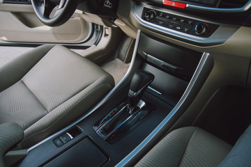 Car interior and automatic car transmission