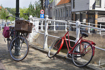 Bicycles near a canal in Delft