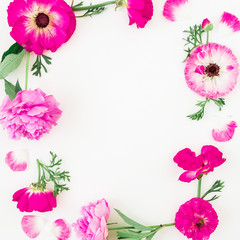 Frame made of pink flowers, roses, peonies and leaves on white background. Floral composition. Flat lay, top view.