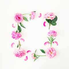 Frame of pink roses and peonies on white background. Floral composition. Flat lay, top view.