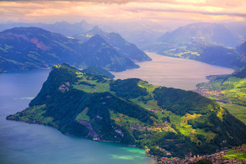 Swiss Alps mountains and Lake Lucerne on dramatic sunset