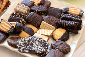 Tray with assorted chocolate pastries and candy