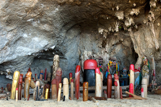 Wooden penis in Princess cave (Phra Nang Shrine Temple). South Railay beach in Krabi. Thailand.