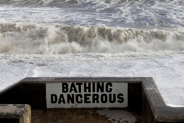 Warning notice that it's dangerous to swim at this beach