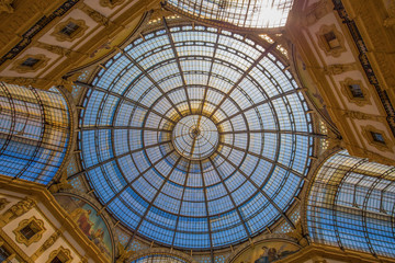 Obraz premium MILAN, ITALY, JUNE 7, 2017 - The inner dome of Vittorio Emanuele II Gallery, shopping mall near Duomo Square, Milan, Italy