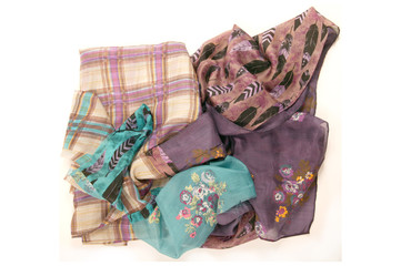 Still life of colorful scarves, draped on table, isolated neckerchief, Women Accessories