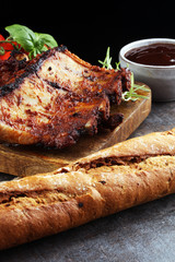 Spicy hot grilled spare ribs from a summer BBQ served with fresh