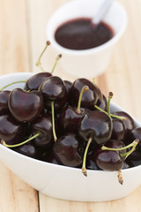 White bolw  with ripe cherries