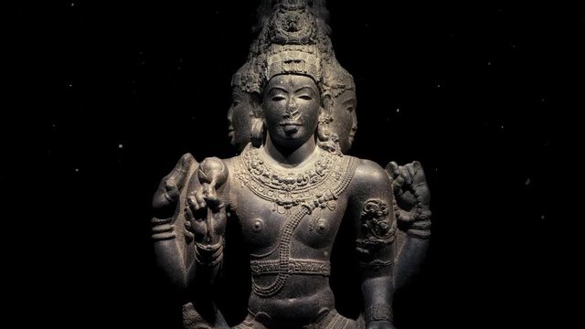 Ancient Religious Statue With Dust Floating Around