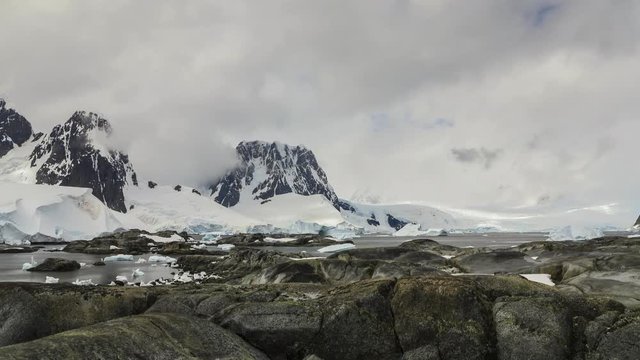 Time lapse clouds over mountains in Antarctica. 