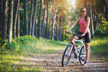 Fototapeta na wymiar cyclist cycling mountain bike on Pine forest trail