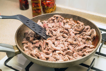 Meat roasted on frying pan