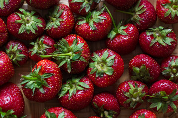 Berries strawberries with leaves healthy natural texture background.