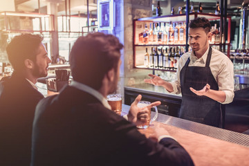 Businessmen in bar