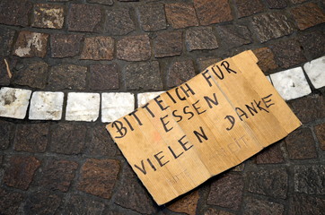 Schild eines Bettlers